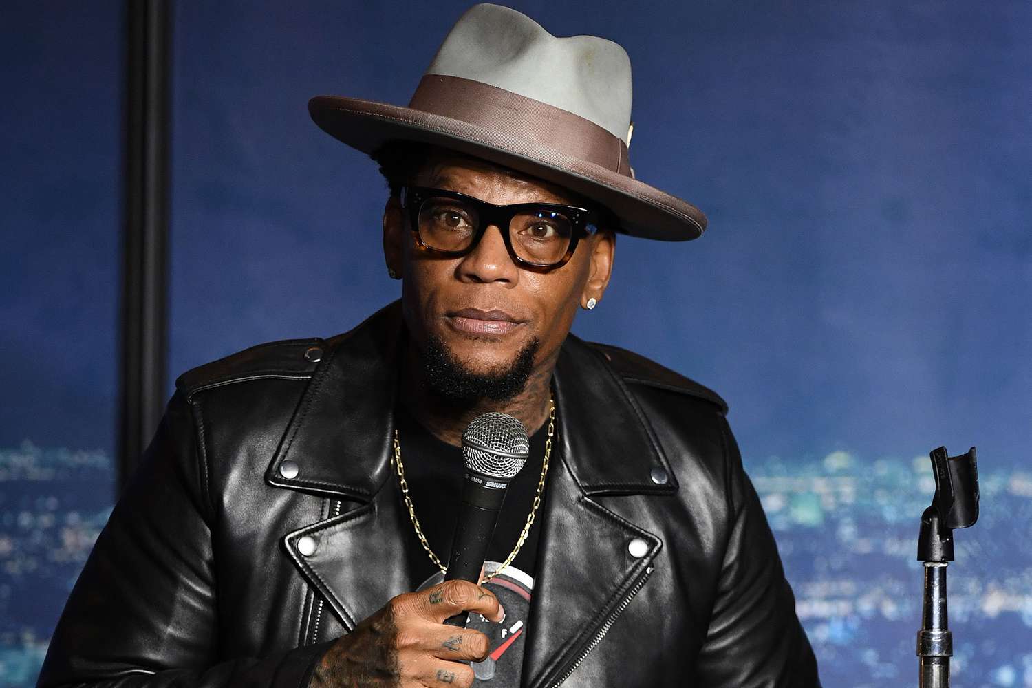 D.L. Hughley performing live on stage