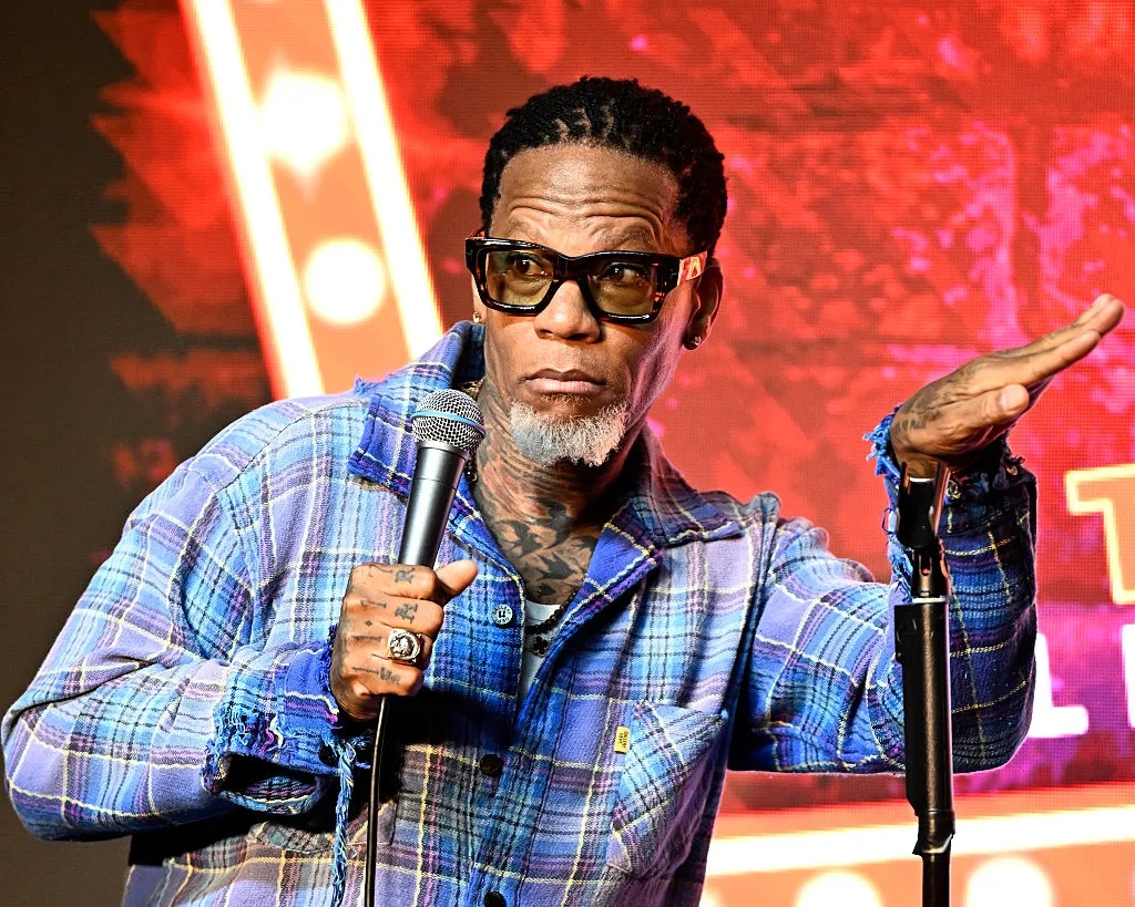 D.L. Hughley performing on tour